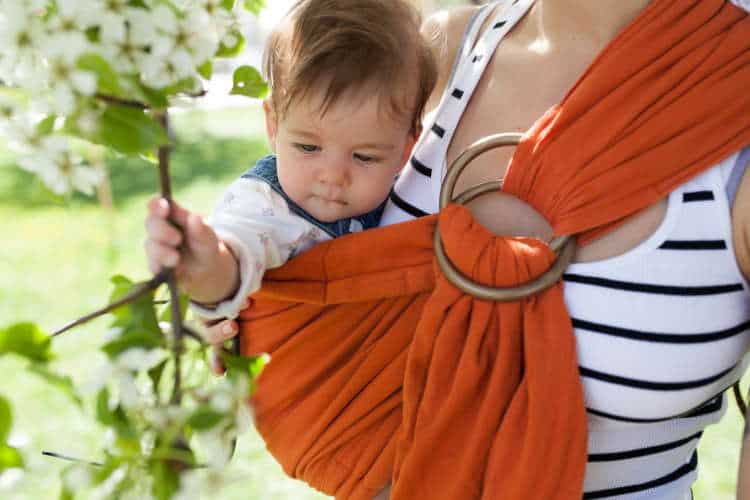 Closeup of toddler in a ring sling