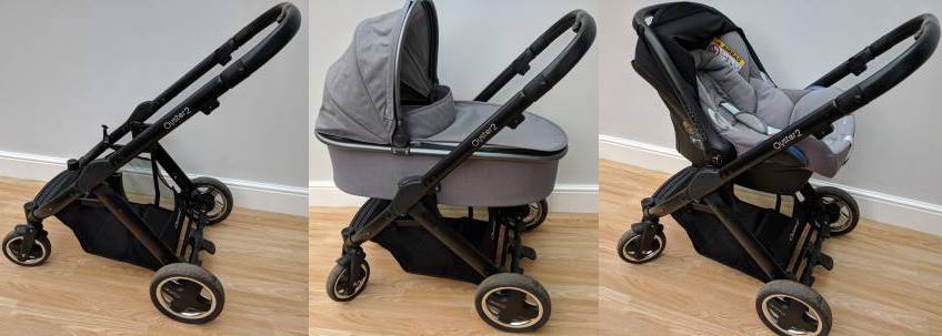 A stroller travel system frame, with bassinet carriage and car seat carriage fitted