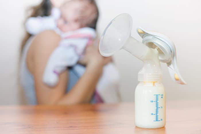 Breastmilk in a manual pump bottle