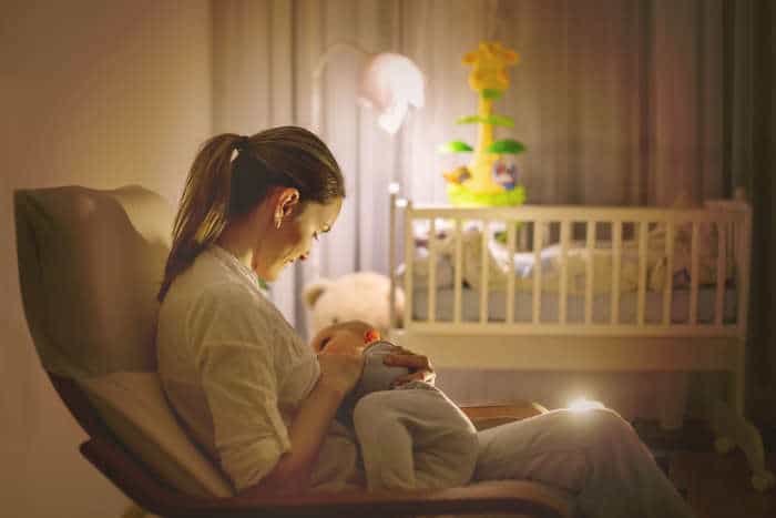 Nursing by nightlight in a nursery