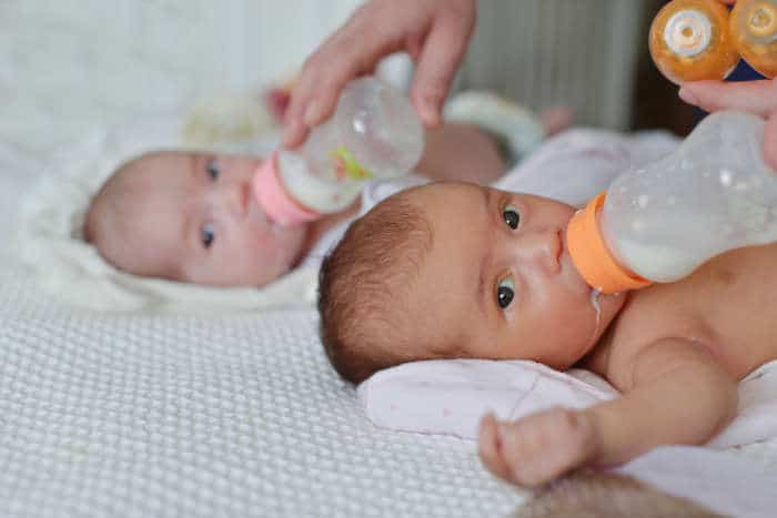 Twins bottle feeding