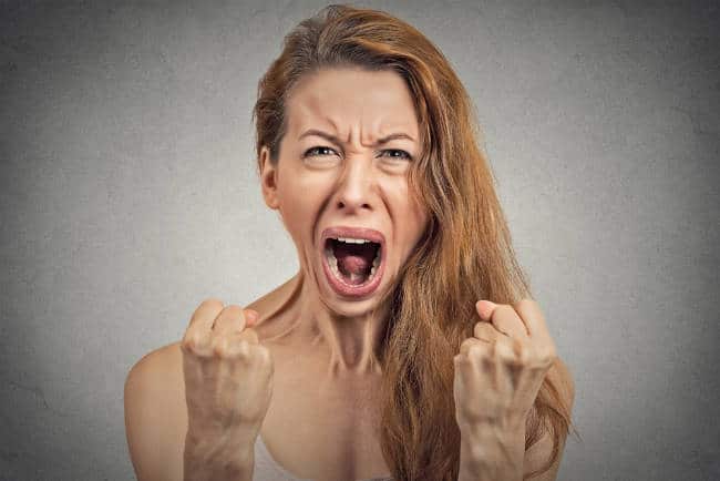 Portrait of an angry woman screaming