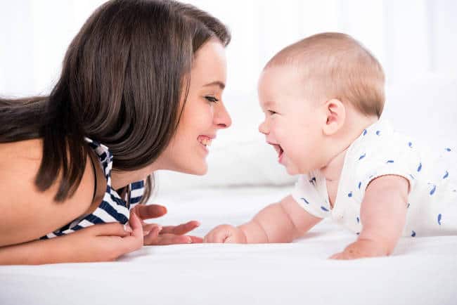 Baby on his tummy with mom