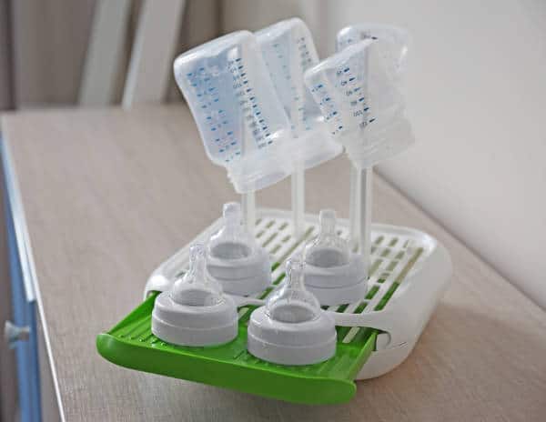 baby bottles drying on a rack