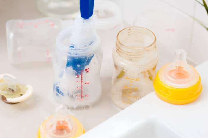 washing baby bottles with dish soap